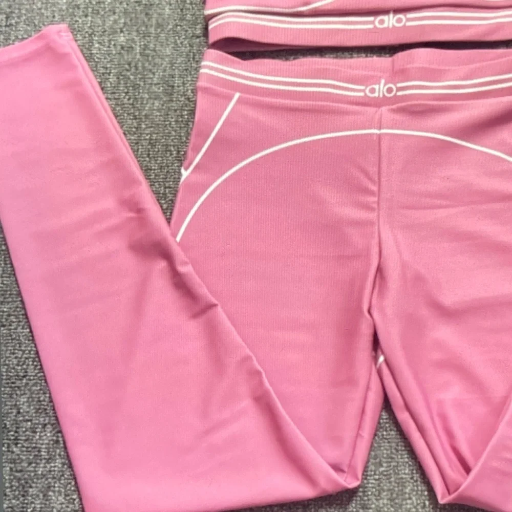 ALO Yoga Pink Ribbed Sports Bra and Leggings Set